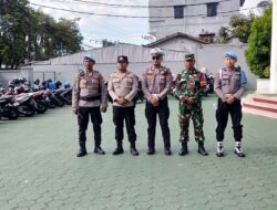 Pastikan Kenyamanan Ibadah Jumat Agung,Babinsa Jajaran Kodim 0907/Trk Dan Babinkamtibmas Amankan Gereja Diwilayah