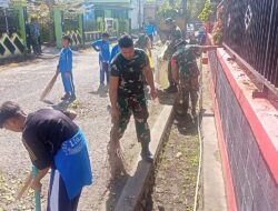 Anggota Koramil 02/Enrekang Bersama Siswa SDN 116 Enrekang Bersihkan Lingkungan Sekolah