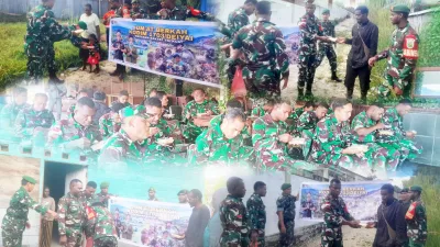 JUM’AT BERKAH DIMAKODIM 1703/DEIYAI, BAGIKAN BUBUR GRATIS UNTUK ANGGOTA KODIM DAN MASYARAKAT