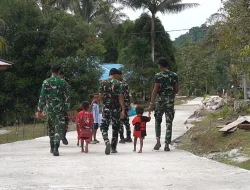 Senyum Anak-Anak Warnai Hasil Pembangunan Jalan Cor 250 Meter TMMD Ke-129 di Kampung Sesor